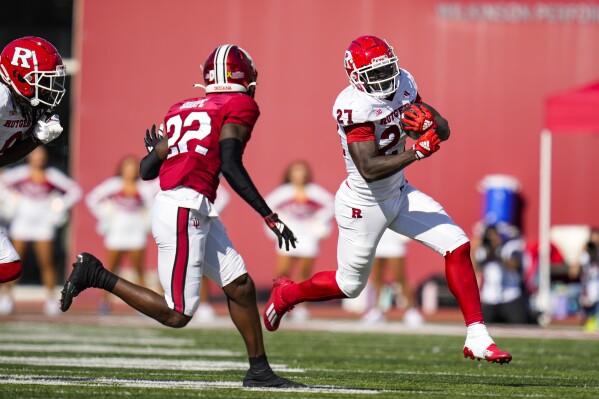 Wimsatt runs for 3 TDs Rutgers bowl eligible after 31 14 win over